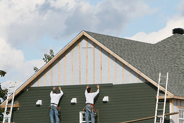 Professional Vinyl Siding technician working in Colfax, IL
